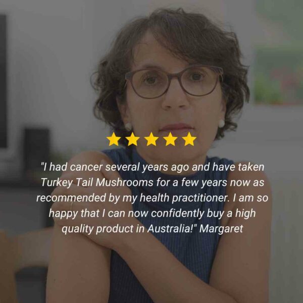 Middle aged woman sharing review for Turkey Tail Mushroom Supplement